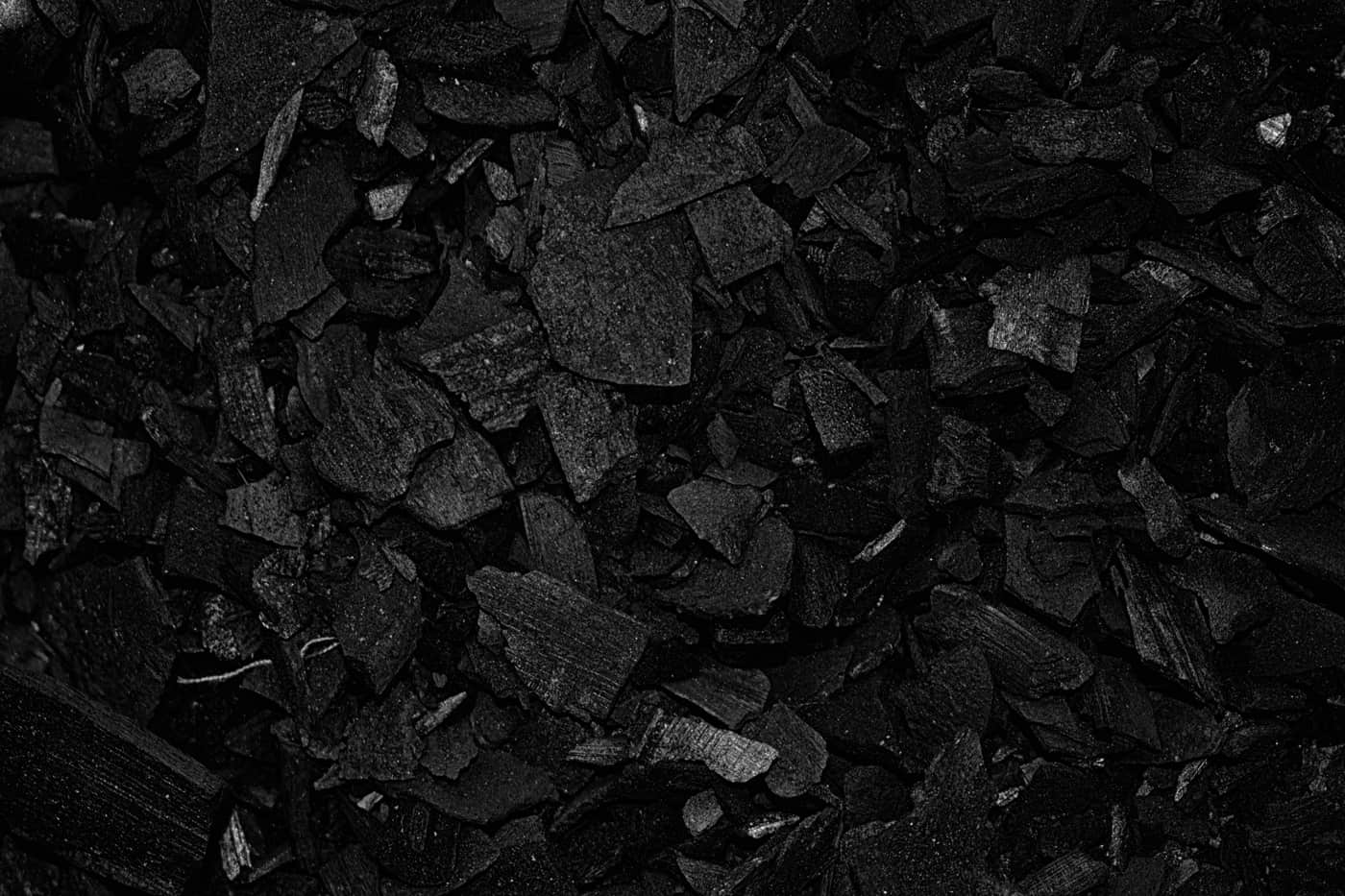 Macro view of filter media granules inside a cut-open cartridge